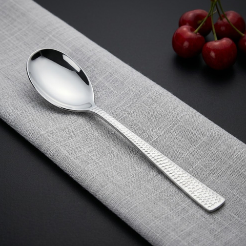Vinod Aero hammered stainless steel dessert spoon set of 12, mirror finish, front view