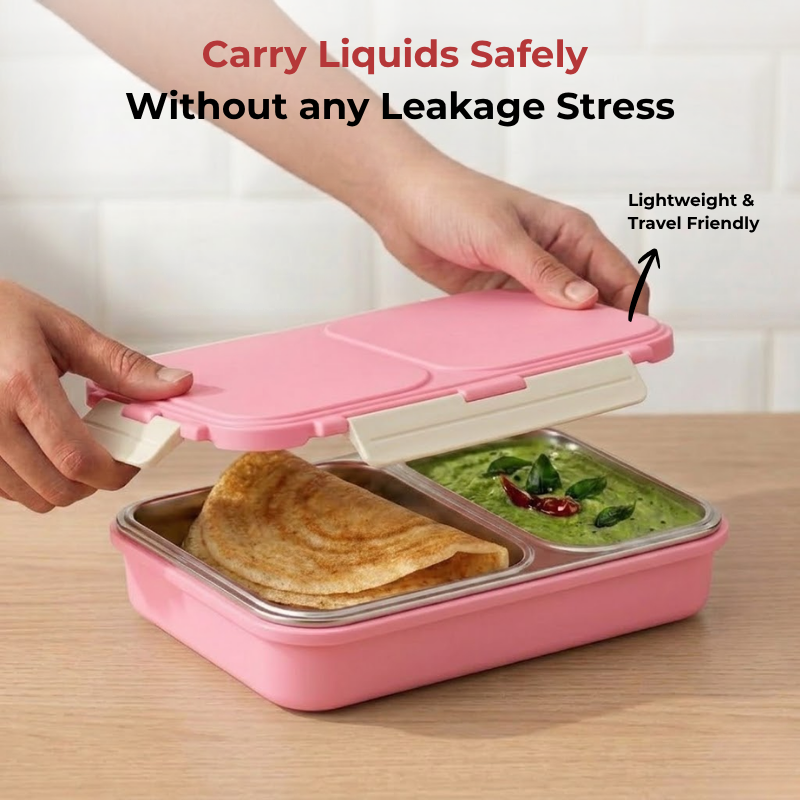 Vinod stainless steel 2 compartment tiffin in pink, silicone-sealed airtight lid, angled view