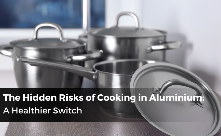 Set of stainless steel cookware on a kitchen counter, promoting the health benefits of stainless steel utensils.