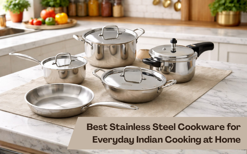 Stainless steel cookware set on marble kitchen counter in Indian kitchen for daily cooking.