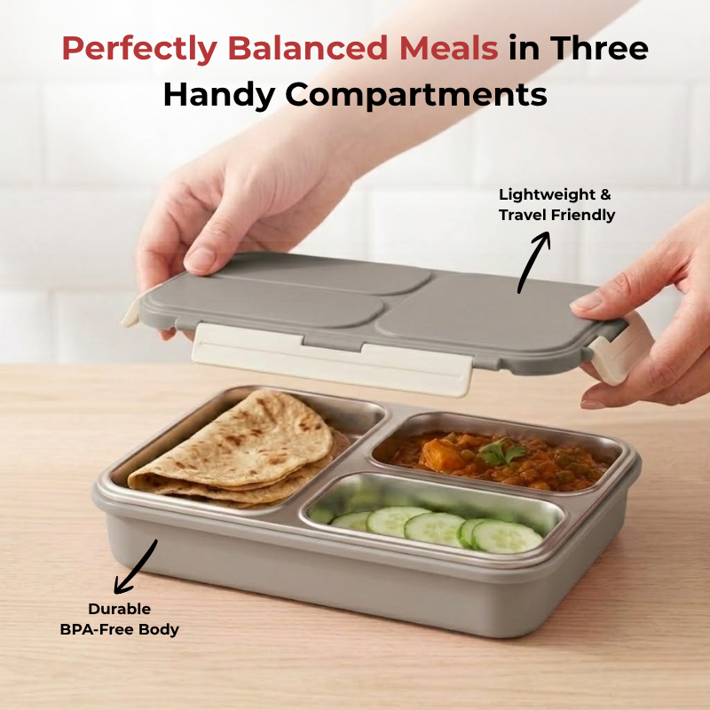 Vinod stainless steel 3 compartment tiffin in grey, silicone-sealed airtight lid, angled view