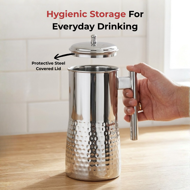 Vinod hammered stainless steel Magnum water pitcher jug with cover, 1700 ml, in-use view